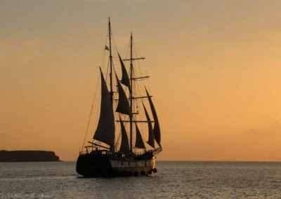 Tall Ship at Sunset in Santorini, Greece