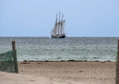 Sailing ship off the beach of Warnemunde, Germany