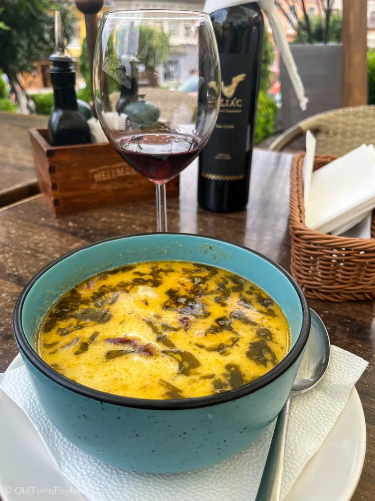 Potato soup with tarragon in Sighisoara, Romania Romanian food includes potato soup with tarragon